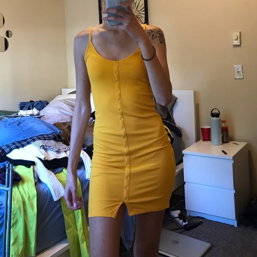 Yellow form fitting dress